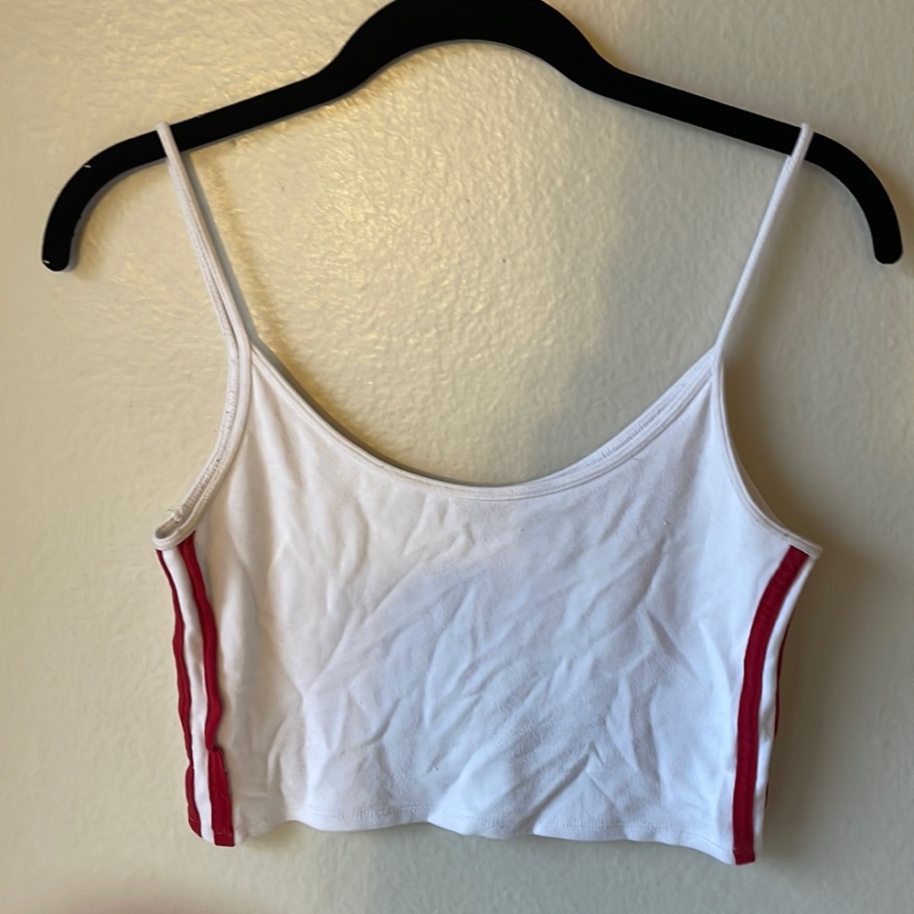 White tank top with 2 red stripes on each side